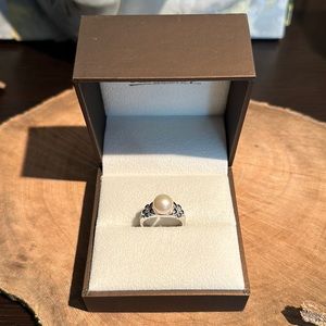 Alamea sterling, silver, pearl and diamond ring only sold in jewelry stores